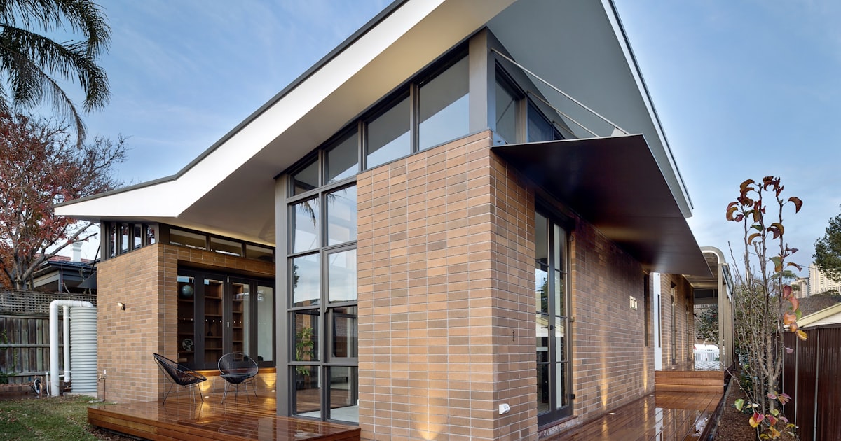 A newly built modern home stands on an established street in Chatswood, Sydney